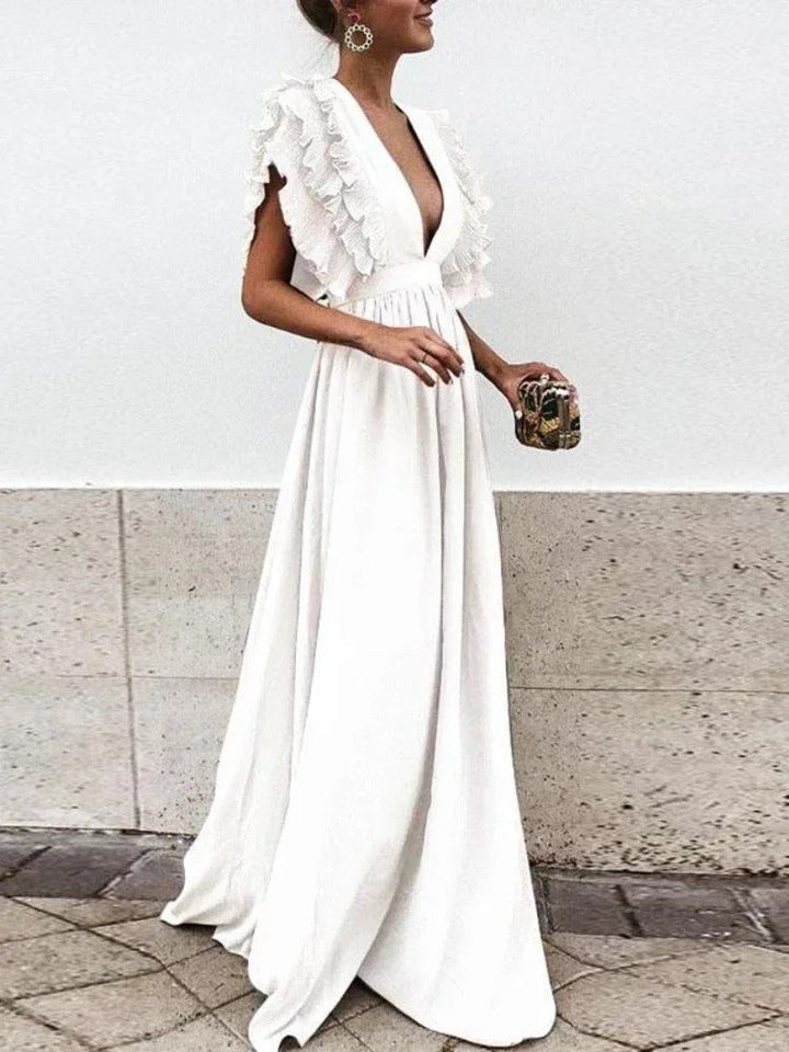 Robe maxi femme élégante, col V, coupe fluide. Plusieurs couleurs disponibles.