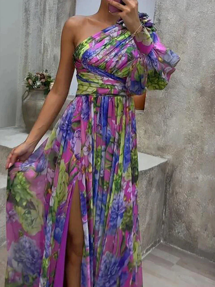 Robe maxi femme sexy asymétrique à imprimé lilas, fente latérale. Idéale pour cocktail ou soirée élégante.