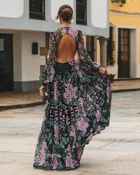 Robe maxi fleurie vintage Saturnina dos nu élégante pour femme, idéale été/cocktail. Tissu fluide, motifs floraux.