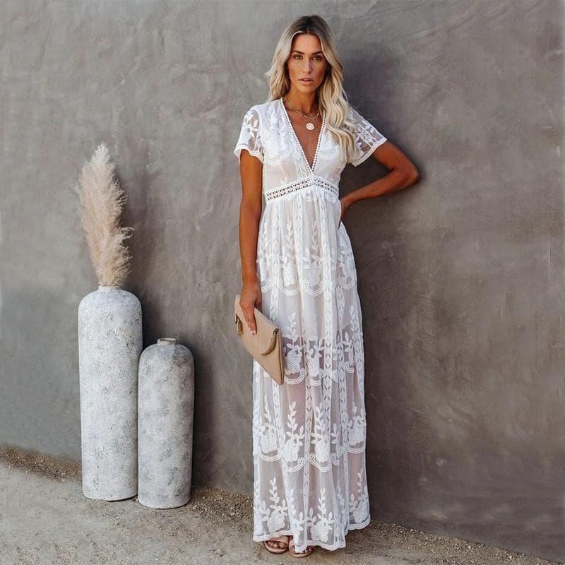 Robe maxi fluide et élégante, longue, taille ajustable.  Parfaite pour toutes occasions.