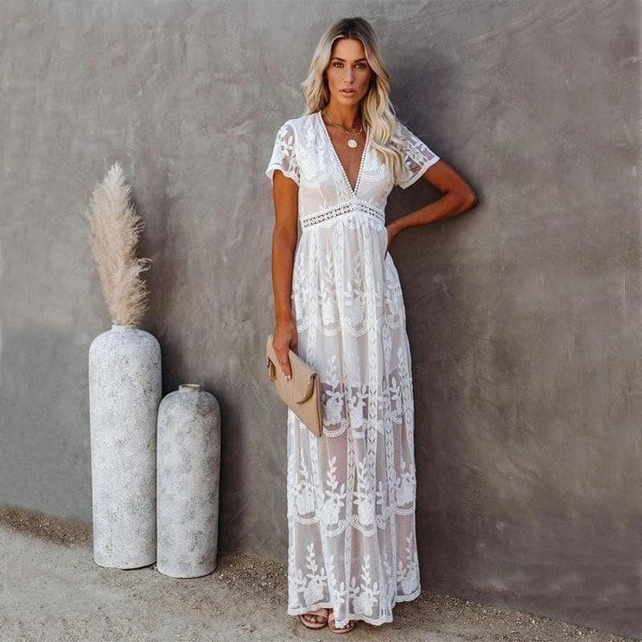 Robe maxi fluide et élégante, longue, taille ajustable.  Parfaite pour toutes occasions.