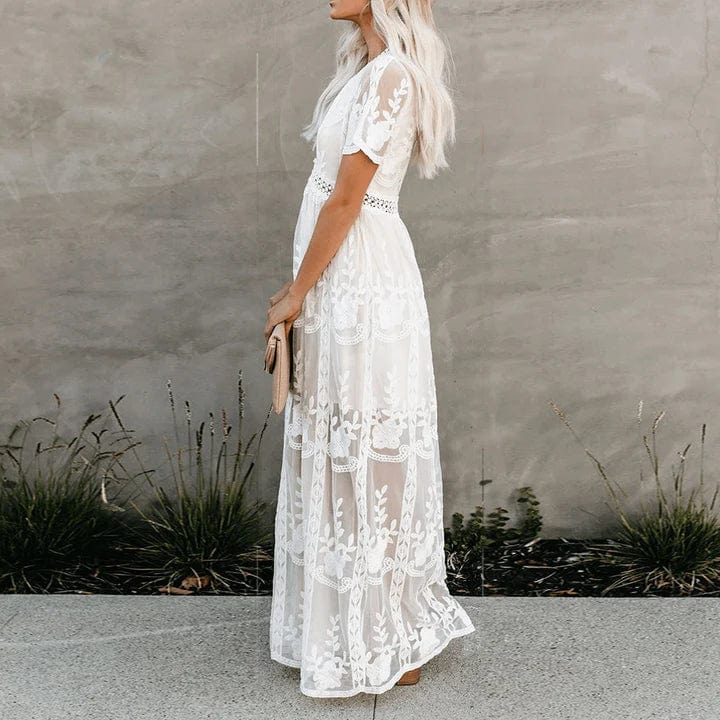 Robe maxi fluide et élégante, longue, taille ajustable.  Parfaite pour toutes occasions.
