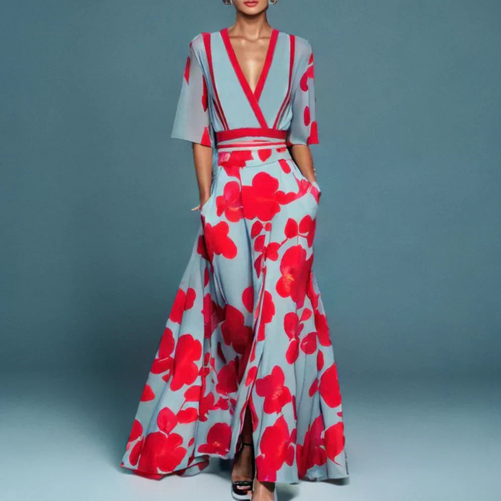 Robe maxi fluide, imprimé floral élégant, col V, manches 3/4.  Parfaite pour toutes occasions.