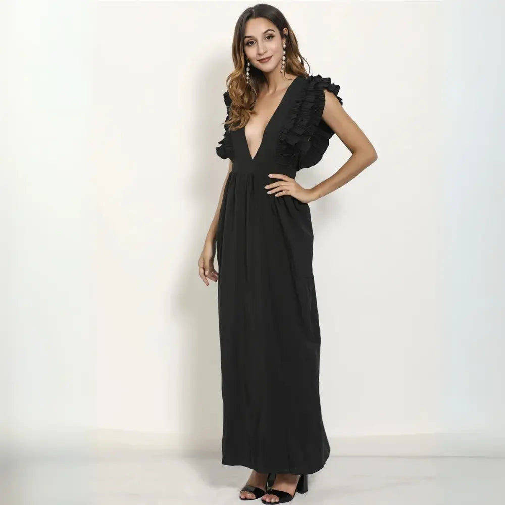 Robe maxi fluide, volants élégants, coupe cintrée.  Parfait pour les occasions spéciales.