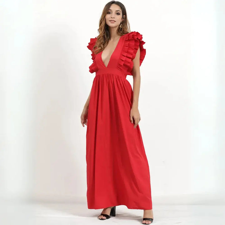 Robe maxi fluide, volants élégants, coupe cintrée.  Parfait pour les occasions spéciales.