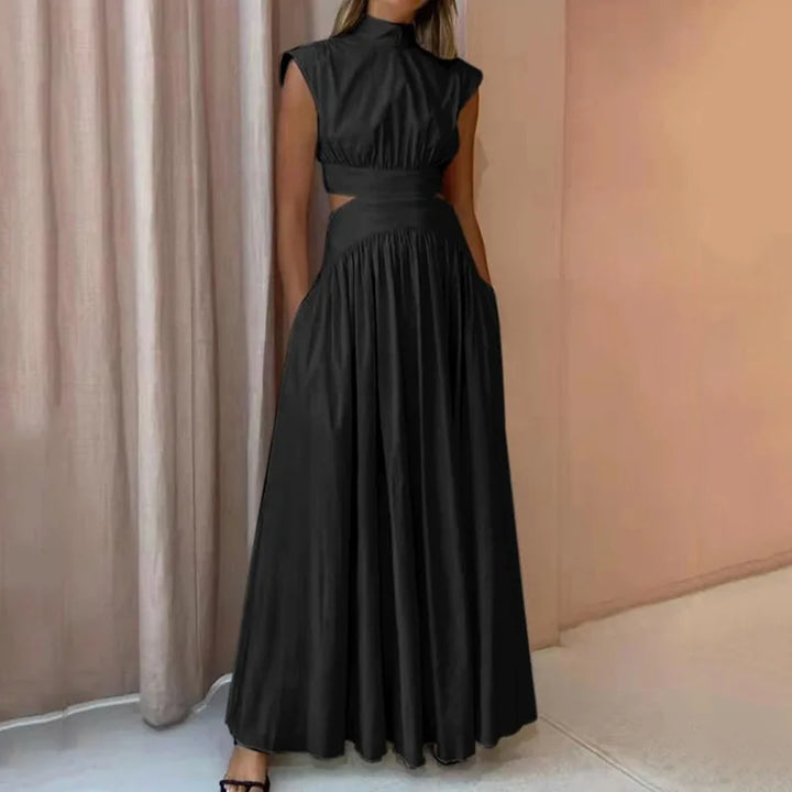 Superbe robe de soirée longue, coupe maxi féminine. Idéale pour cocktails, mariages et événements habillés.