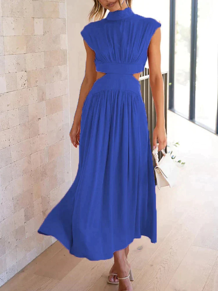 Robe de cocktail maxi fluide et confortable pour femme. Tenue polyvalente pour cérémonies ou soirées élégantes.