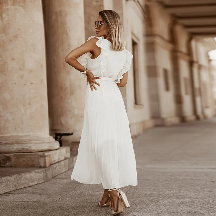 Mode féminine: robe maxi à volants, idéale pour un look sophistiqué en toute saison.
