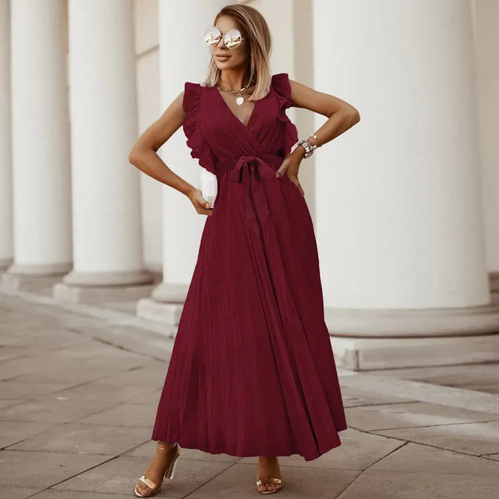Vue de dos d'une robe maxi élégante à volants, détails fluides pour un look raffiné.
