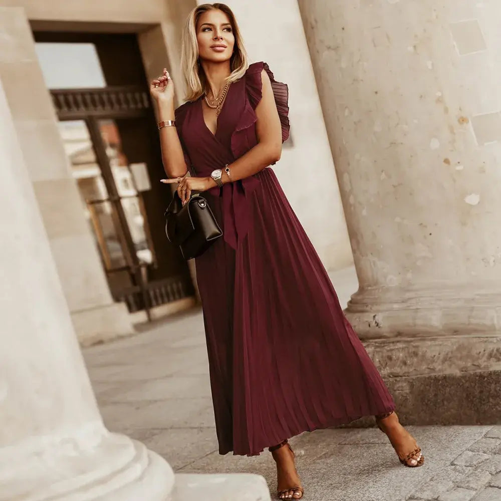 Robe maxi à volants, coupe élégante et taille ajustée, idéale pour tenue de soirée.