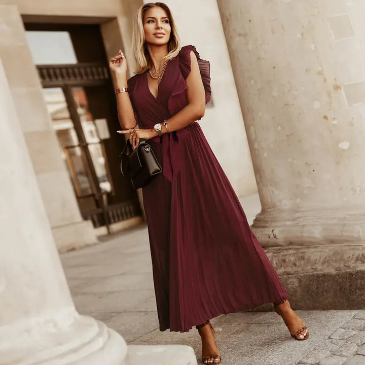 Robe maxi à volants, coupe élégante et taille ajustée, idéale pour tenue de soirée.