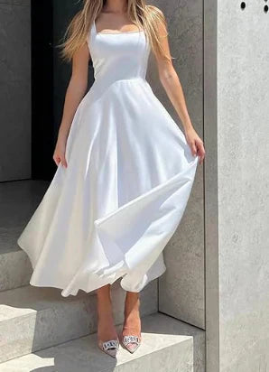 Robe longue femme chic et confortable, coupe évasée pour un style fluide. Idéale pour cocktail ou soirée.