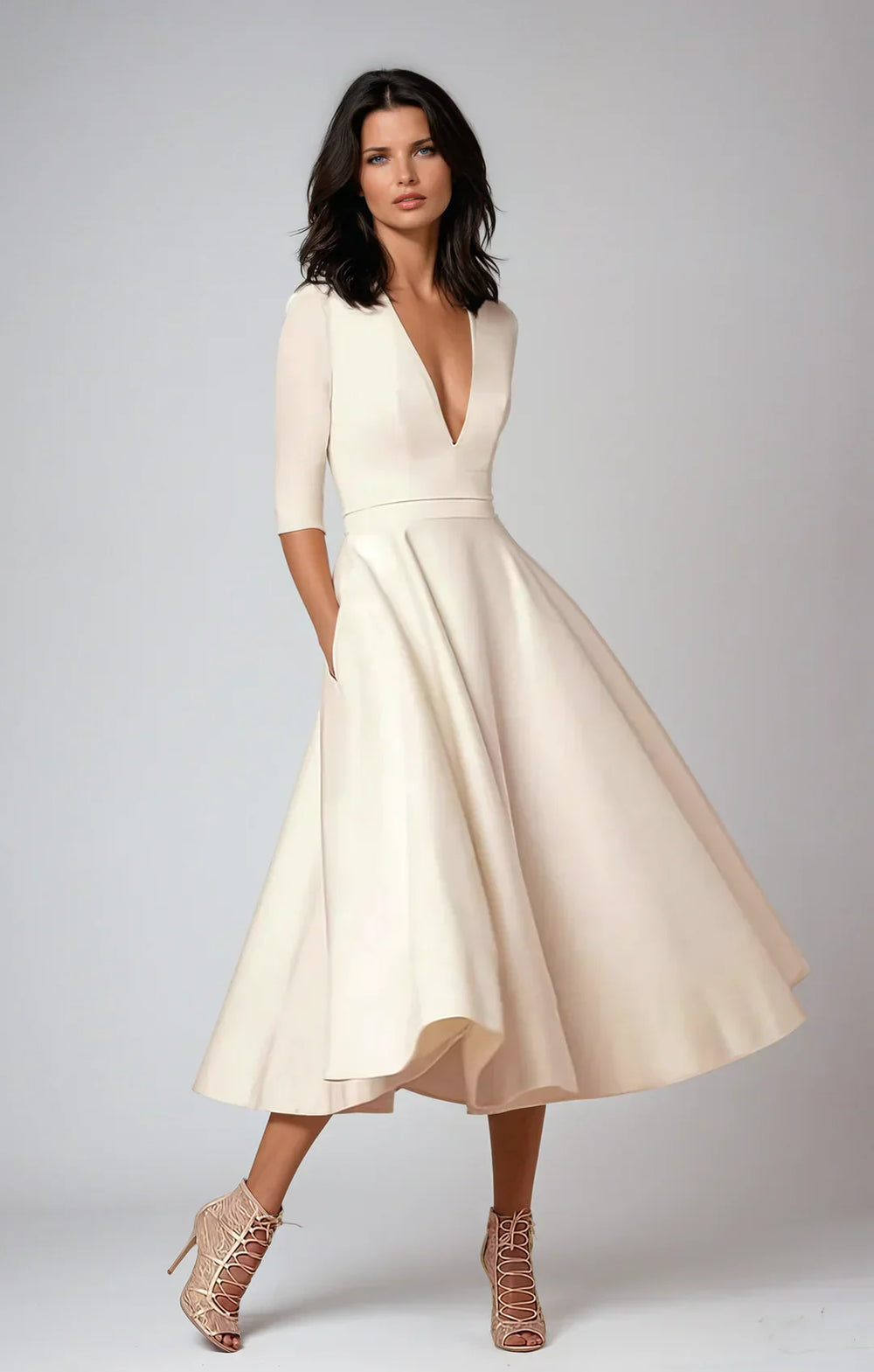 Robe midi A-ligne élégante, décolleté V, tissu luxueux.  Coupe flatteuse et confortable.