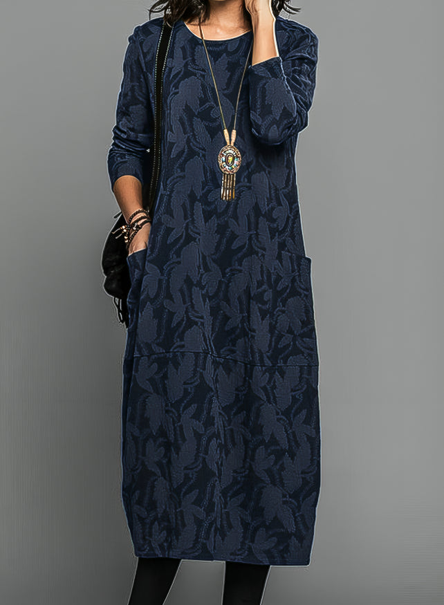 Robe midi élégante et polyvalente pour femme, style ample et confortable, idéale pour toute occasion.