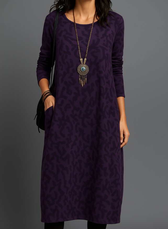 Robe midi ample chic pour femme, coupe confortable et élégante, idéale pour un look décontracté moderne.