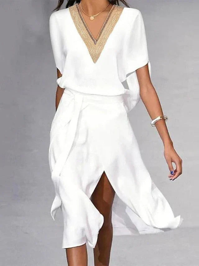 Robe midi blanche Isabella pour femme, col en V. Style élégant, minimaliste et intemporel. Parfaite pour un look chic.