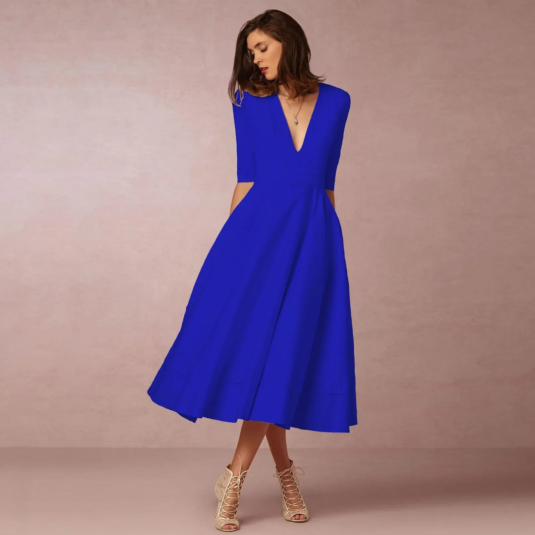 Robe élégante femme, midi cintrée, style décontracté chic, confortable pour toutes occasions.