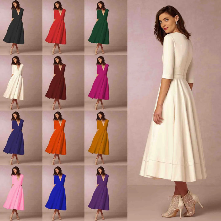 Robe cintrée midi, mode femme, col rond, longueur midi, parfaite pour un look féminin et moderne.