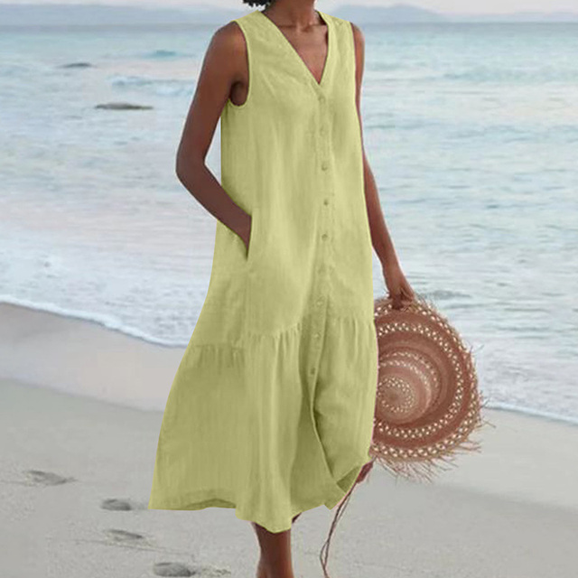 Robe été femme, coupe midi ample, boutonnée. Style bohème chic, col V. Confort et élégance estivale.