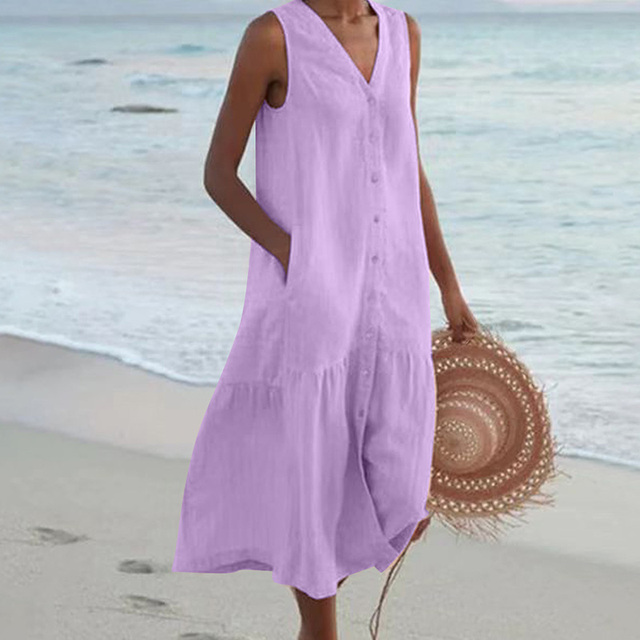 Robe midi femme ample boutonnée. Vêtement d'été polyvalent, sans manches. Confortable et mode femme.