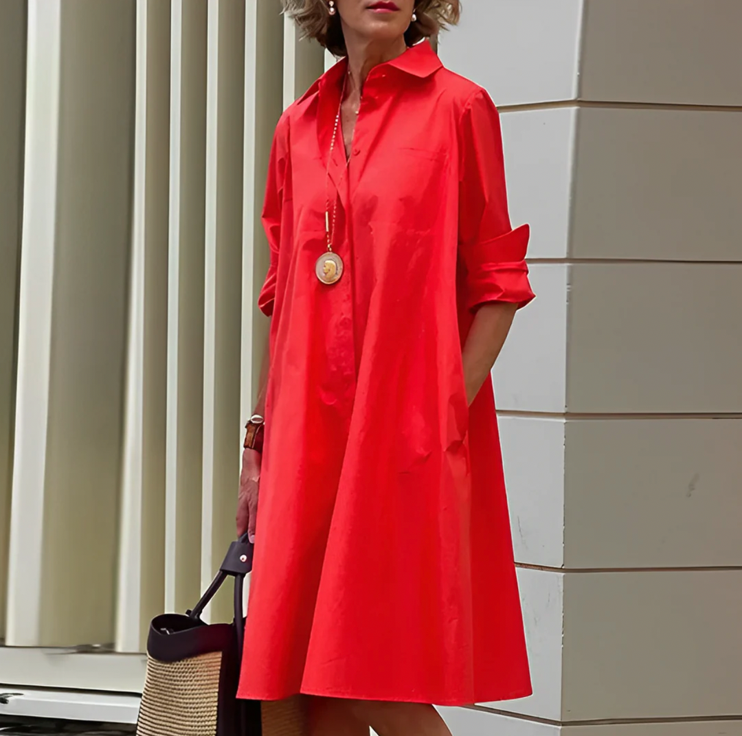 "Robe midi d'été élégante, silhouette flatteuse, tissu léger et aéré, idéale pour journées chaudes et occasions spéciales."