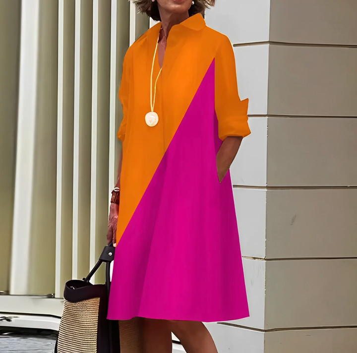 "Robe midi d'été élégante, silhouette flatteuse, tissu léger et aéré, idéale pour journées chaudes et occasions spéciales."