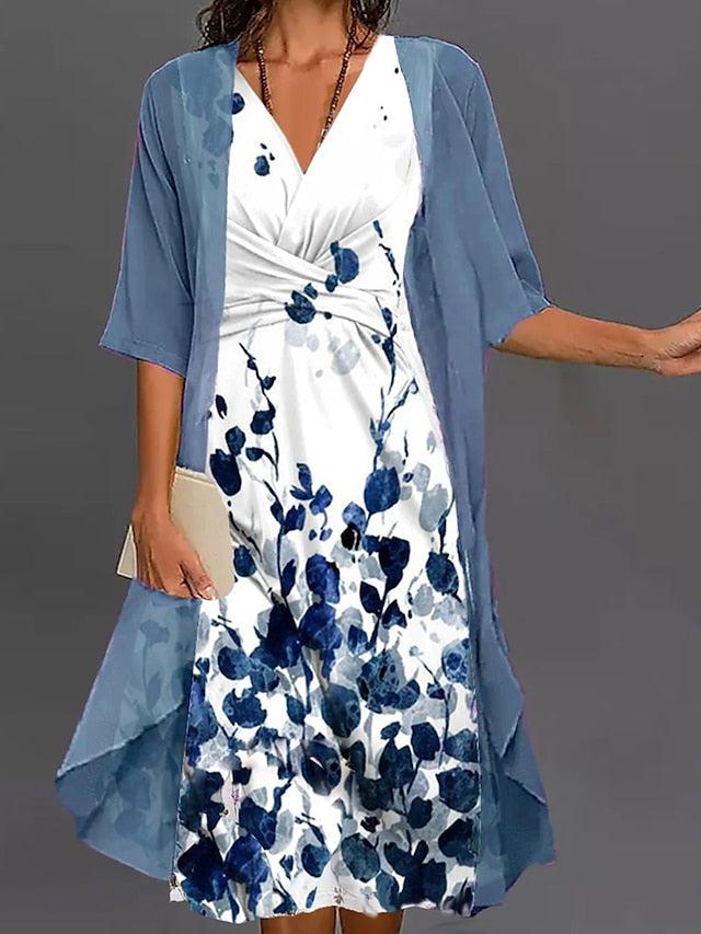 Robe midi deux pièces, motif floral, coupe élégante et confortable.  Idéale printemps/été.