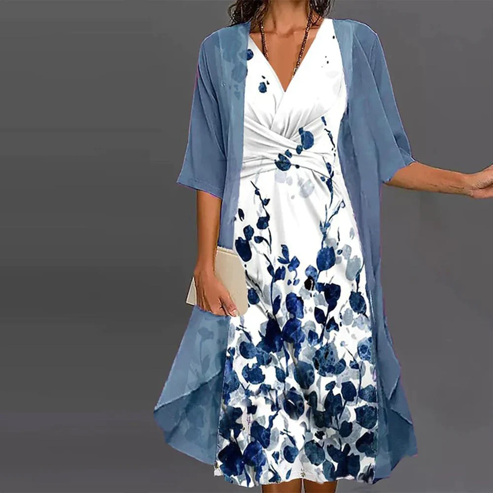 Robe midi deux pièces, motif floral, coupe élégante et confortable.  Idéale printemps/été.