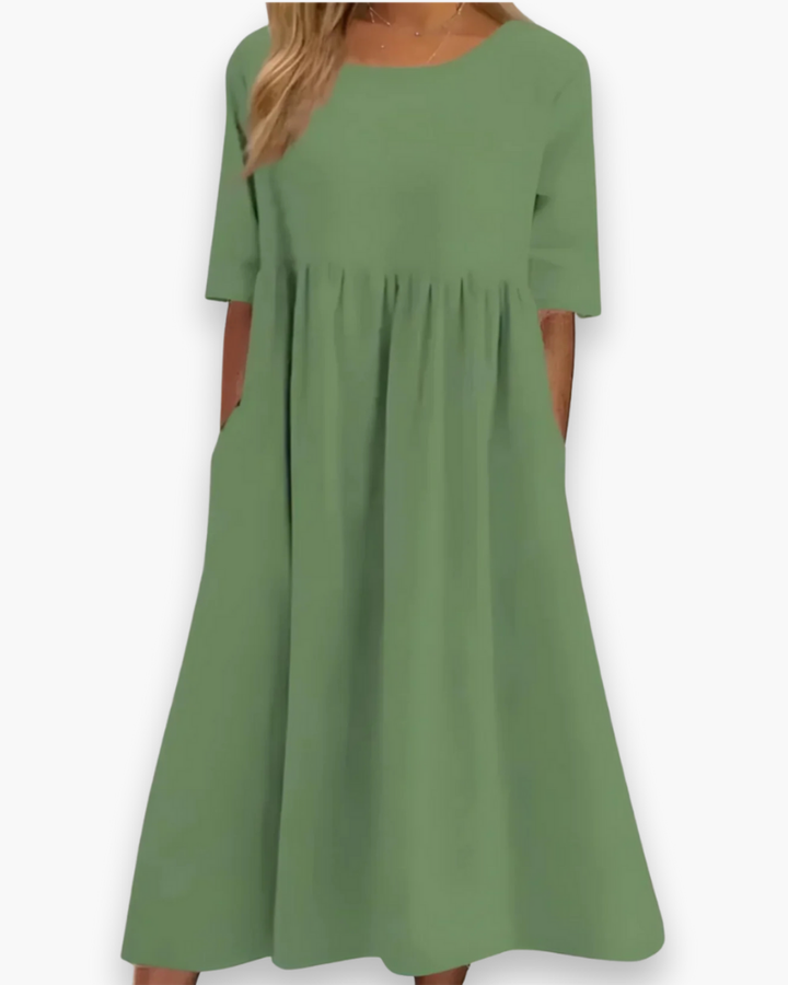 Robe midi élégante femme, blanche, style décontracté avec poches et tissu léger, parfaite toutes occasions.