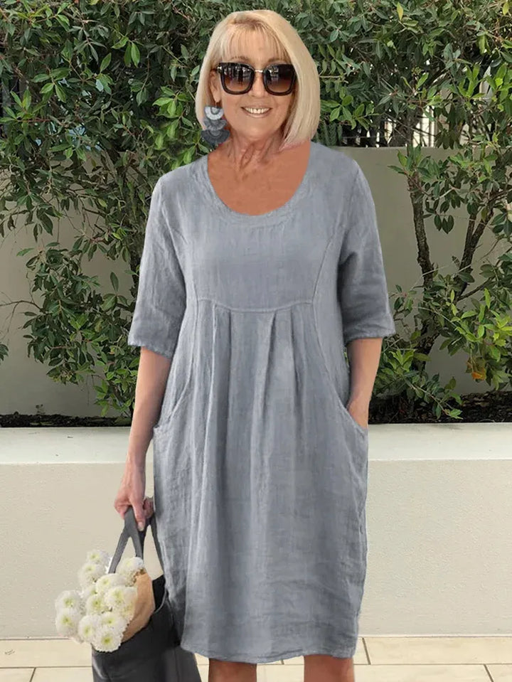 Robe midi été en coton lin, coupe ample, poches. Style décontracté et léger.