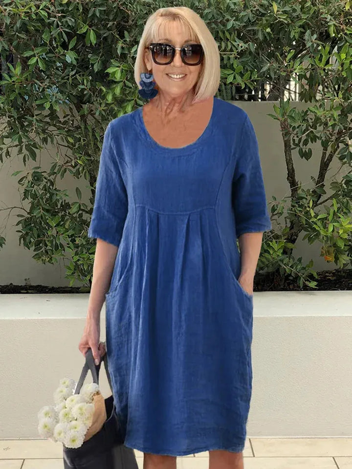 Robe midi été en coton lin, coupe ample, poches. Style décontracté et léger.