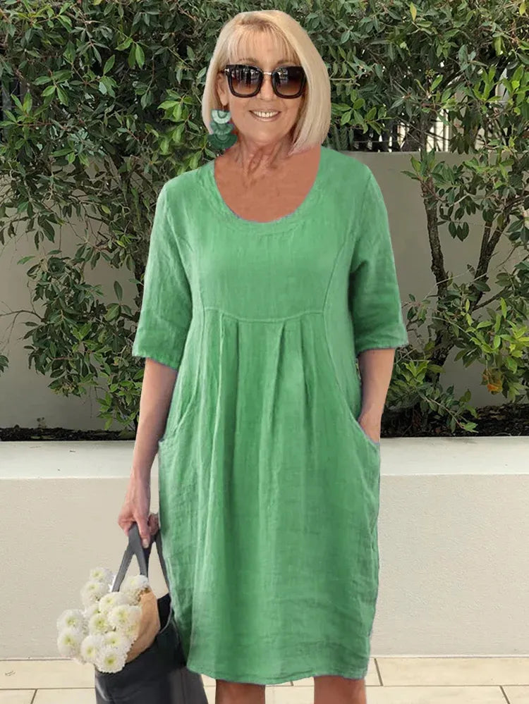 Robe midi été en coton lin, coupe ample, poches. Style décontracté et léger.