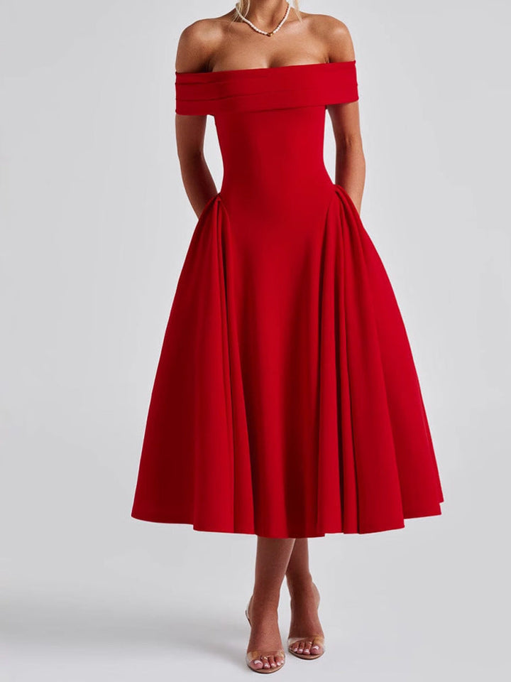 "Robe midi évasée, épaules dénudées, coupe cintrée, encolure bardot, fluide, élégance intemporelle, longueur mollet."