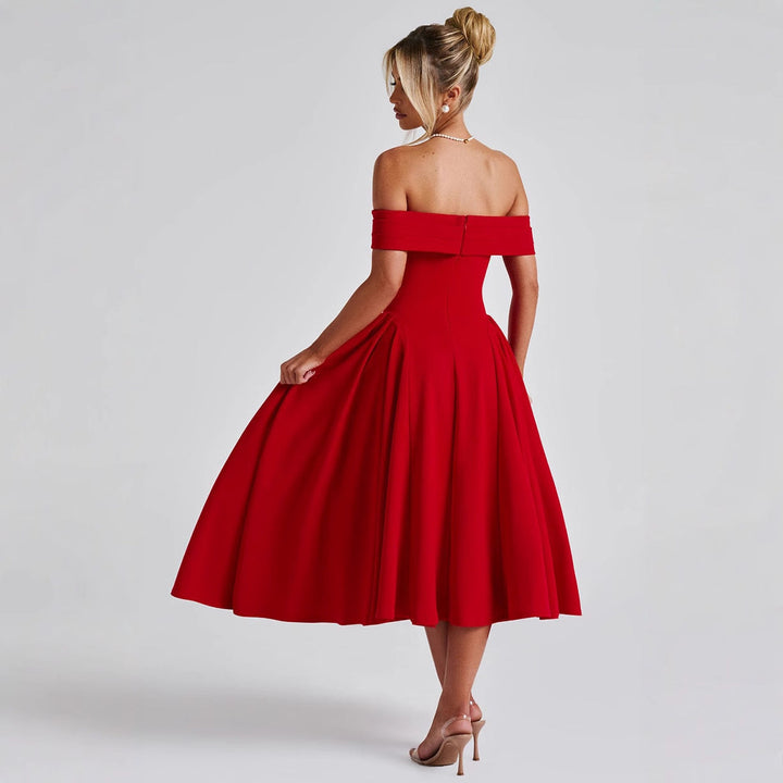 "Robe midi évasée, épaules dénudées, coupe cintrée, encolure bardot, fluide, élégance intemporelle, longueur mollet."