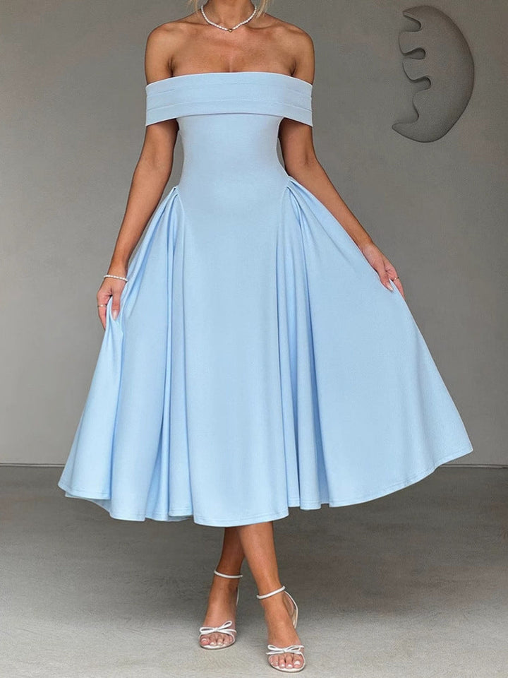 "Robe midi évasée, épaules dénudées, coupe cintrée, encolure bardot, fluide, élégance intemporelle, longueur mollet."