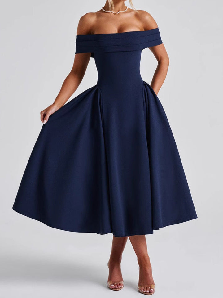 "Robe midi évasée, épaules dénudées, coupe cintrée, encolure bardot, fluide, élégance intemporelle, longueur mollet."