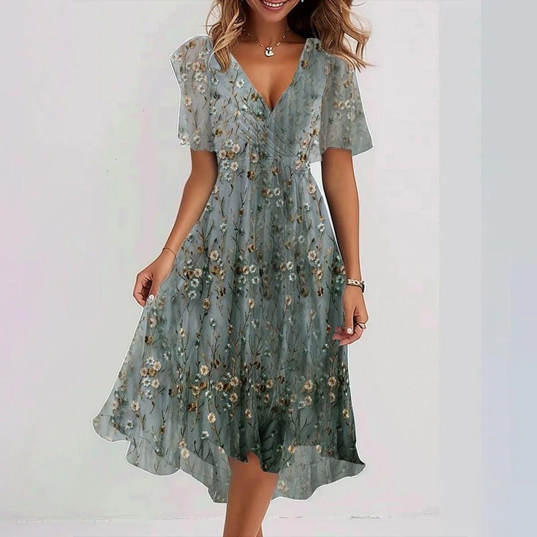 Robe midi femme été, col V, fluide, imprimé floral.  Tissu chiffon léger, coupe cintrée.