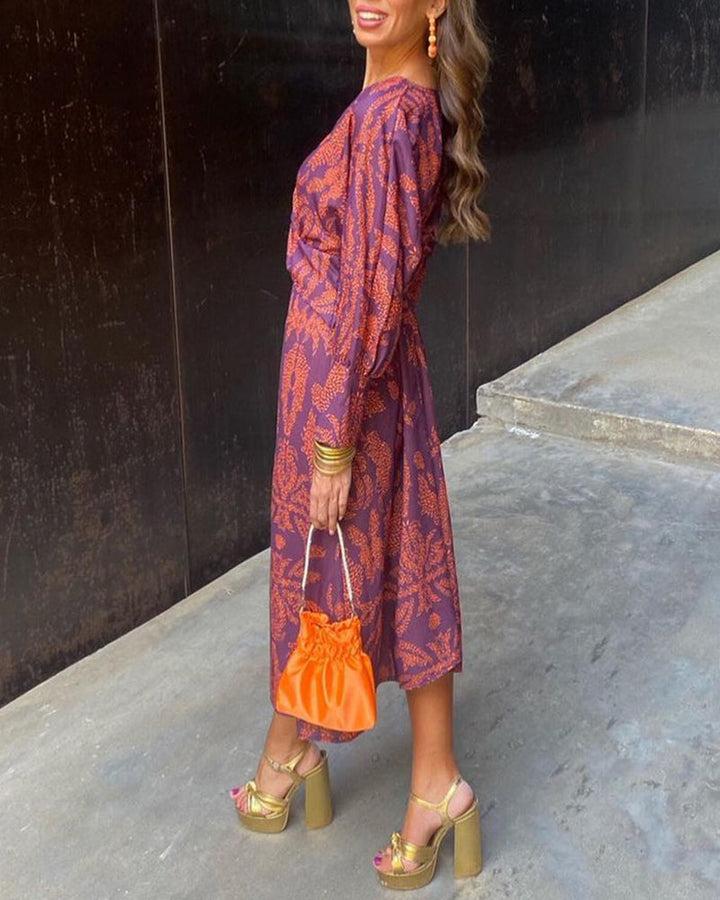 Robe midi élégante femme pour événement, décolleté en V, style raffiné et flatteur. Idéale pour cocktail.