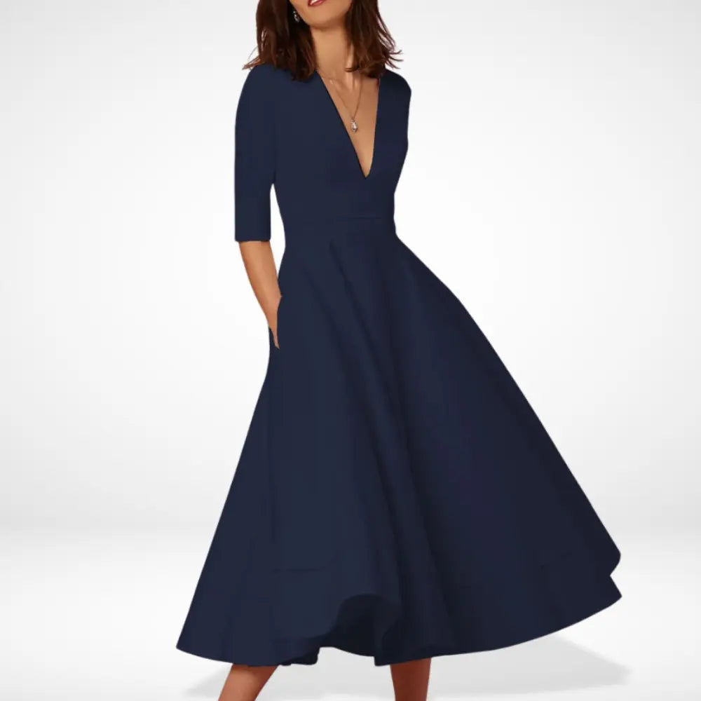 Superbe robe midi femme fluide avec décolleté. Idéale pour un mariage, une soirée ou un événement spécial.