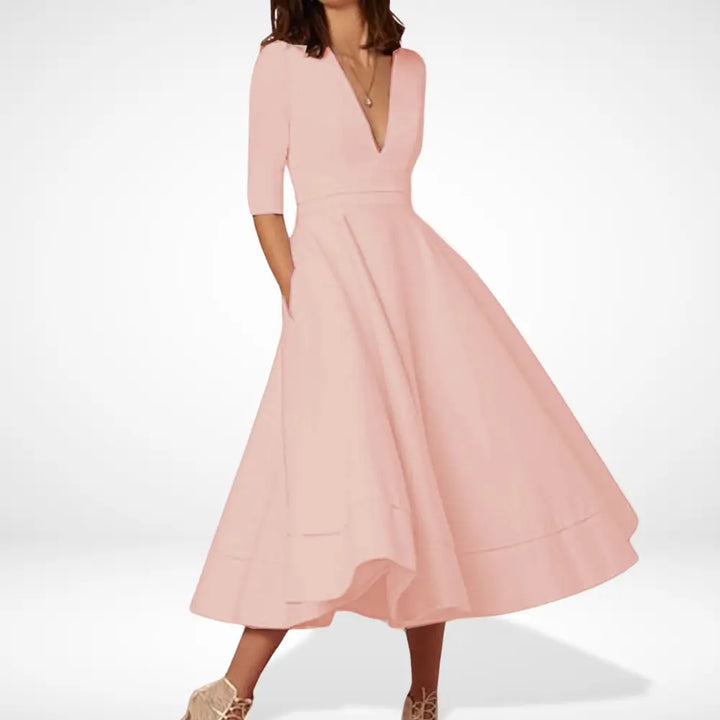 Robe midi femme à décolleté élégant, idéale pour mariage, soirée ou événement chic. Fluide et moderne.
