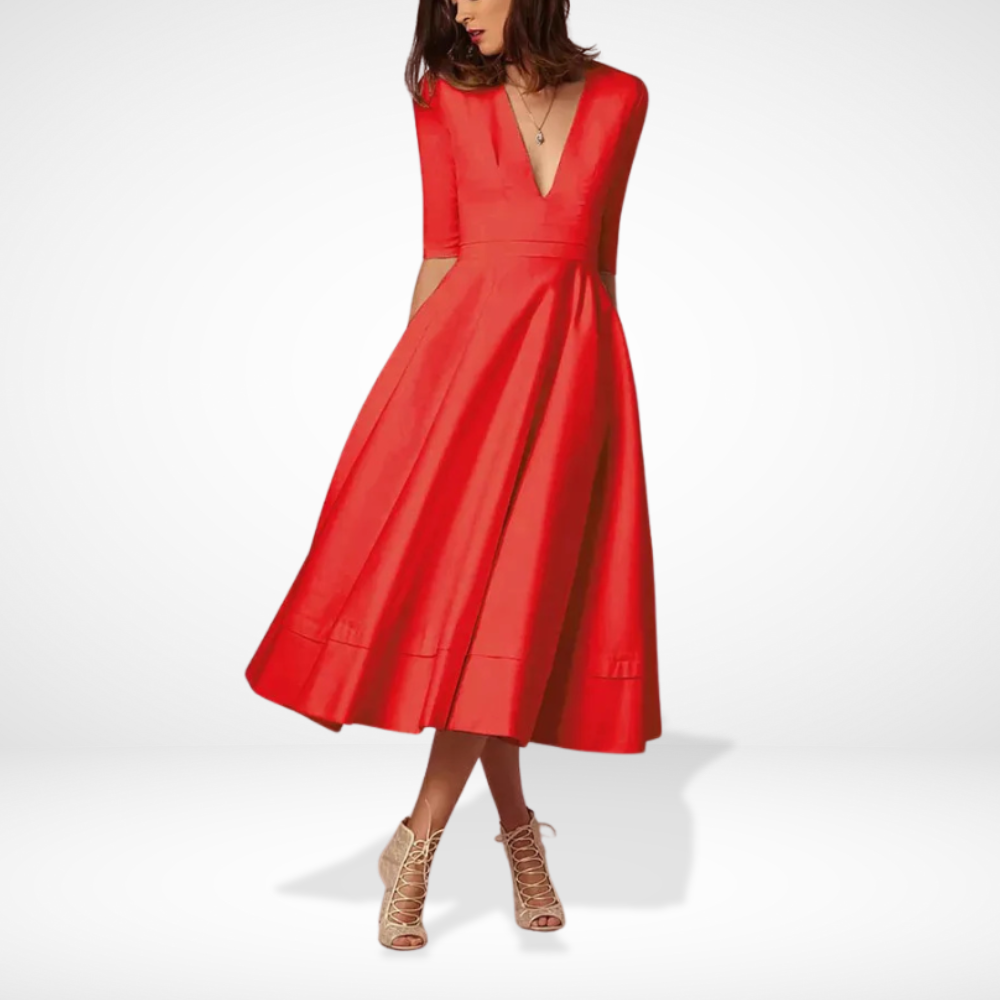 Robe de soirée midi femme chic et fluide à décolleté. Idéale pour mariage, fête ou cocktail élégant.