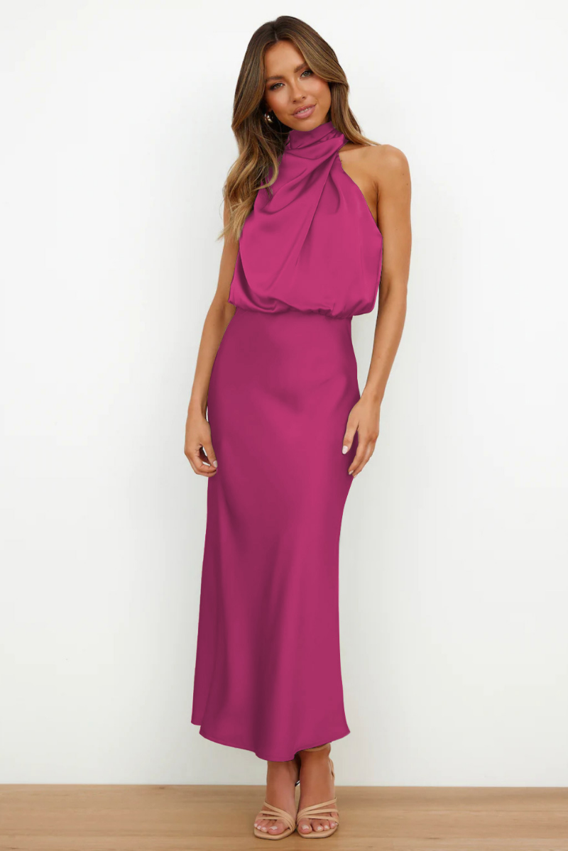 Robe midi femme moderne, design asymétrique. Parfaite pour un look chic de cocktail ou soirée printemps-été.