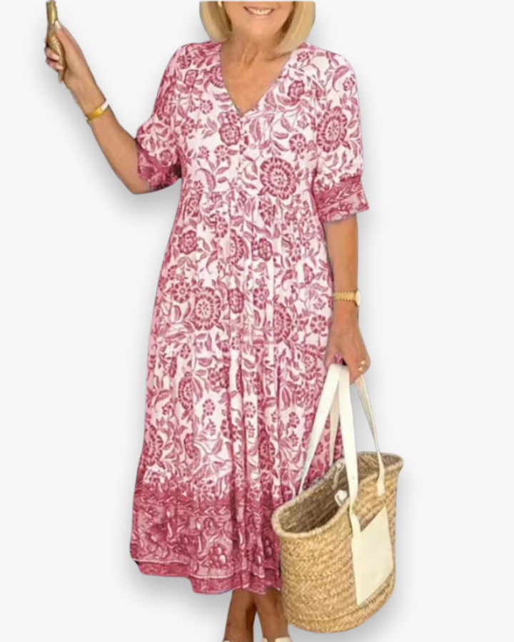 "Robe midi fleurie élégante femme, col en V, motif floral, coupe fluide, style estival, idéale pour journées ensoleillées."