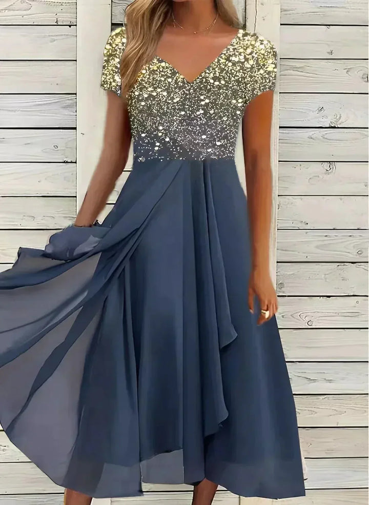 Tendance robe de soirée midi fleurie pour femme, style romantique, idéale pour printemps-été chic et distingué.