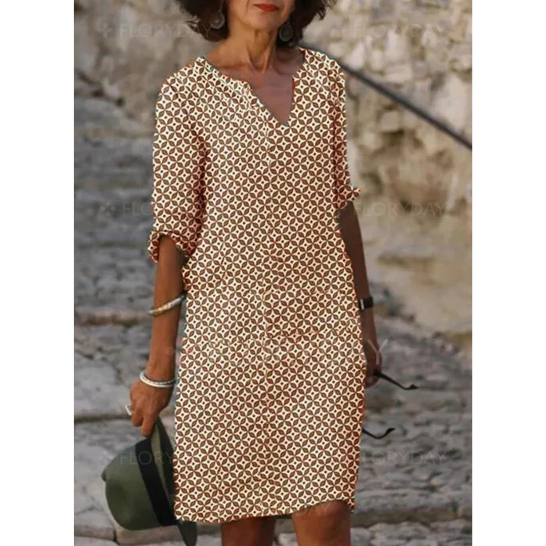 "Robe midi fluide pour femmes, tissu léger et ample, idéale pour l'été et toutes occasions, élégance et confort garantis."