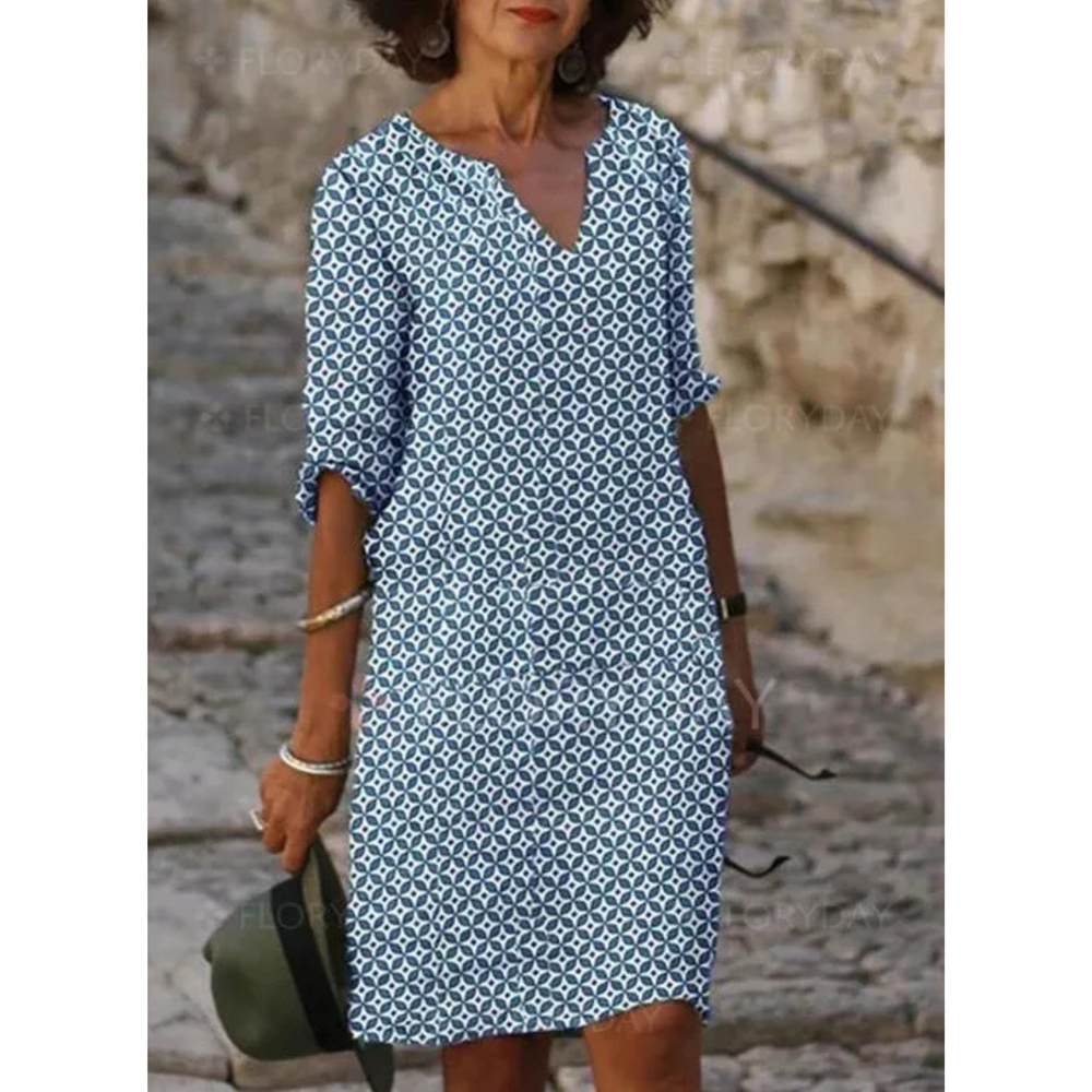 "Robe midi fluide pour femmes, tissu léger et ample, idéale pour l'été et toutes occasions, élégance et confort garantis."