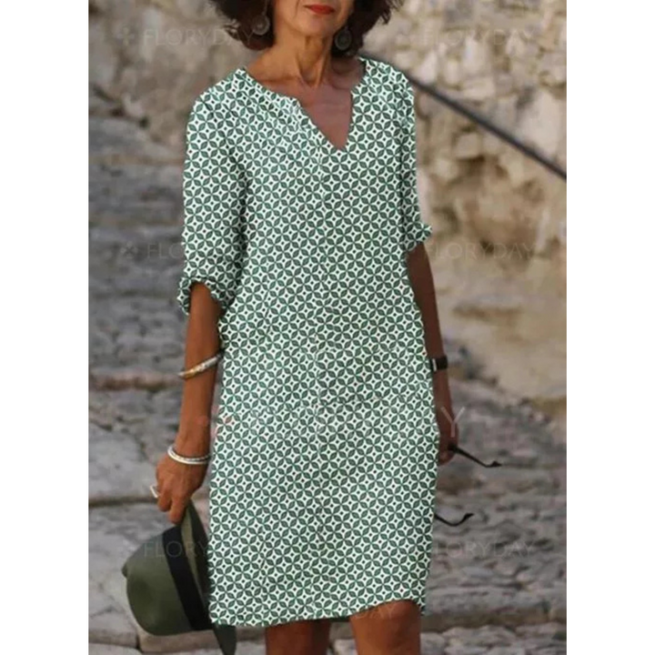 "Robe midi fluide pour femmes, tissu léger et ample, idéale pour l'été et toutes occasions, élégance et confort garantis."