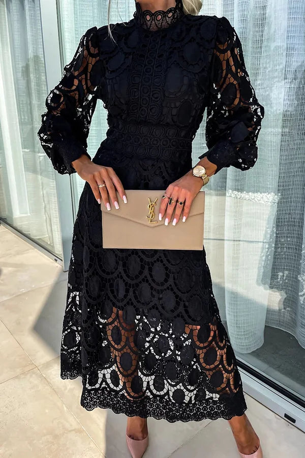 Robe cocktail femme chic à manches lanterne, longueur midi, idéale pour les événements élégants. Style unique.