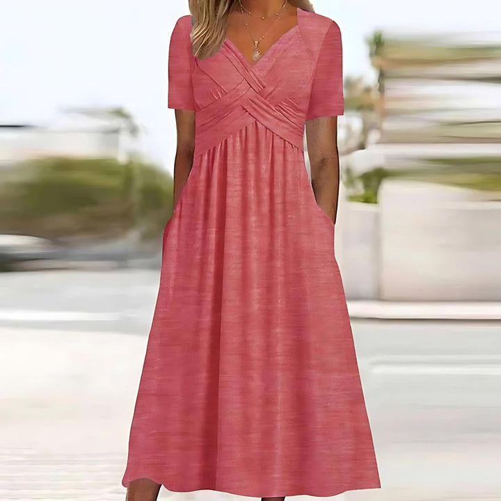 Robe midi chic pour femme, coupe élégante. Confortable, parfaite pour l'été, soirées ou quotidien stylé.