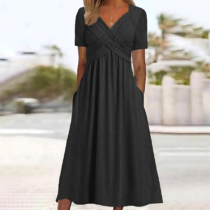 Robe midi flatteuse pour femme. Style élégant et moderne, idéale pour diverses occasions, du bureau à la soirée.